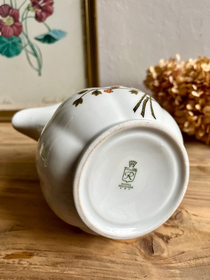 Pichet fleurs oranges