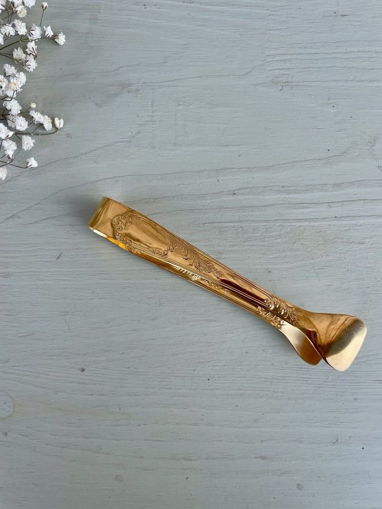 Pince à sucre en métal doré