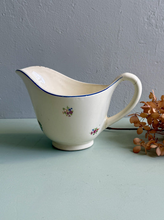 Ancien pot à lait en faïence émaillée décor floral