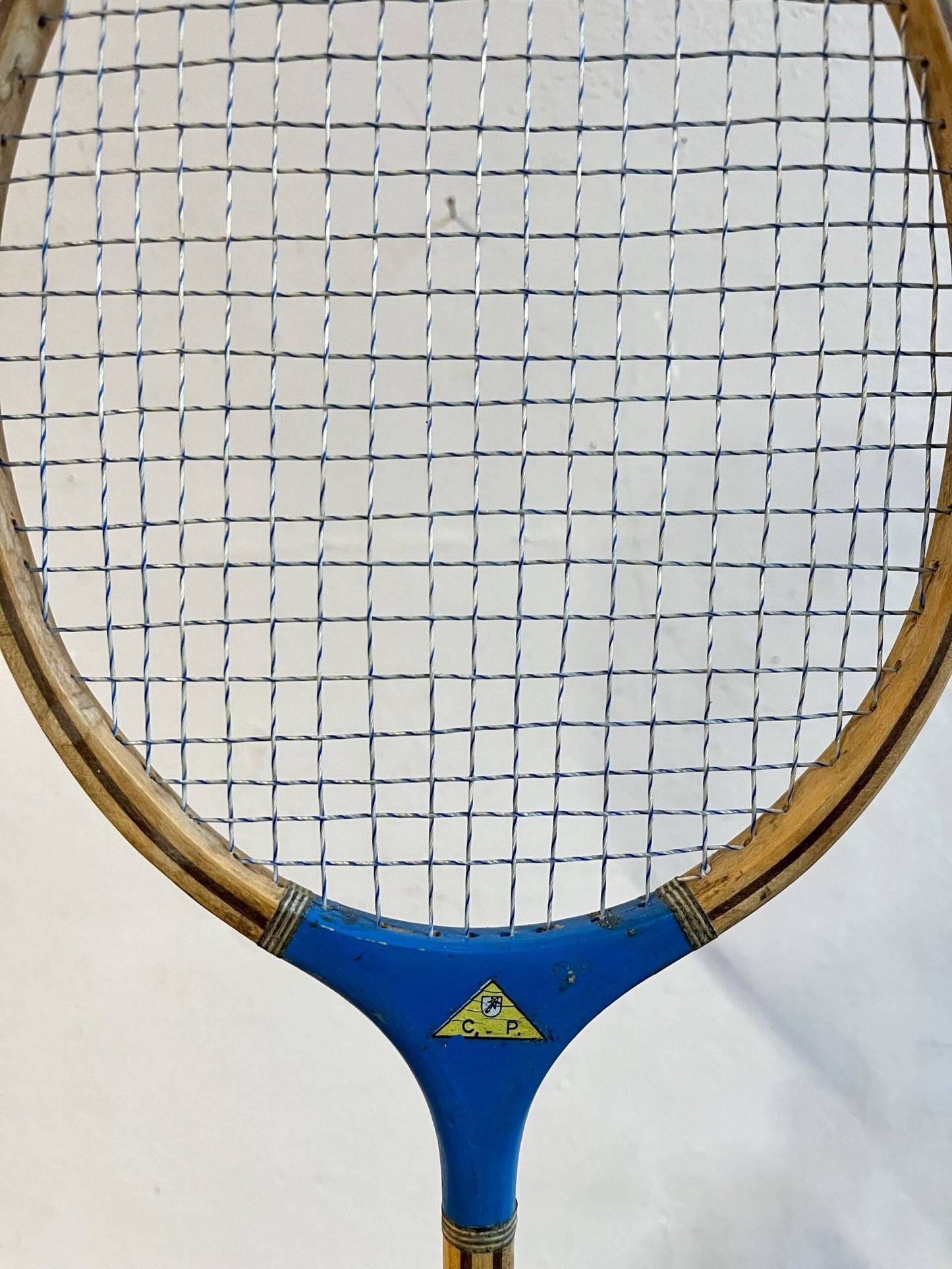 Ancienne raquette de badminton bleue