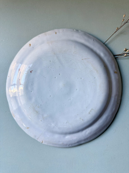 Assiette plate ancienne en faïence motifs floraux