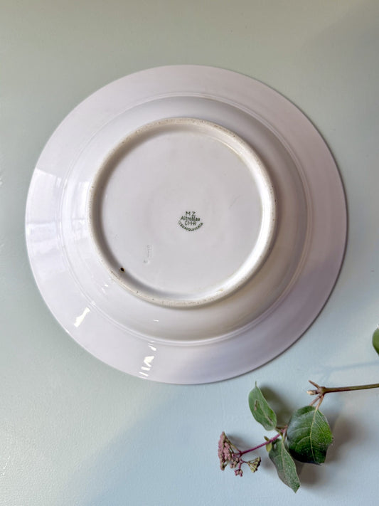 Assiette creuse en faïence fleurie