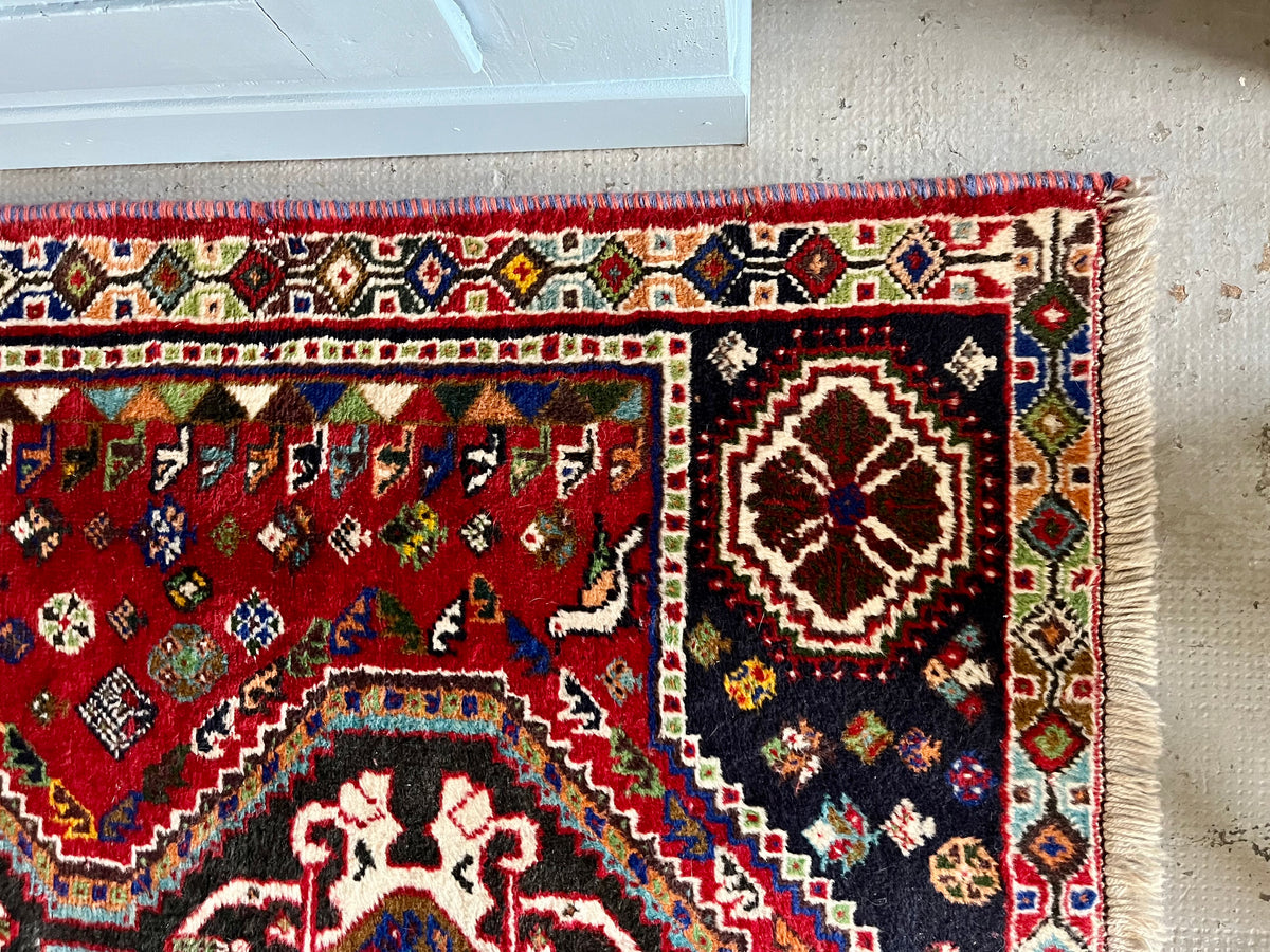 Tapis ancien à motifs  Décoration Patine