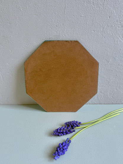 Miroir octogonal - bord ciselé