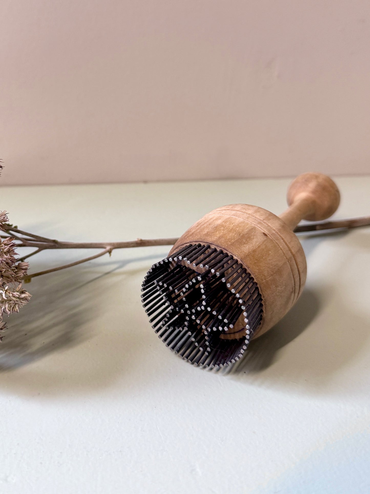 Tampon à pain en bois et métal