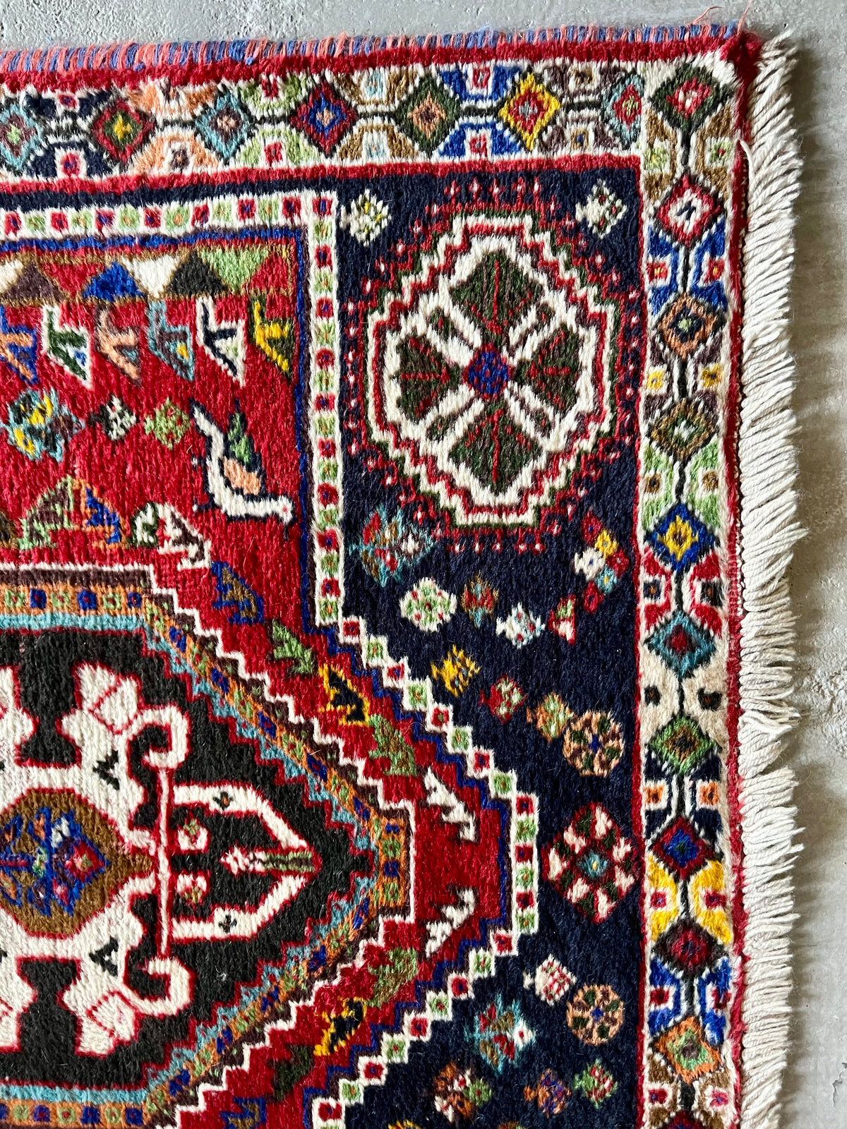 Tapis ancien à motifs  Décoration Patine