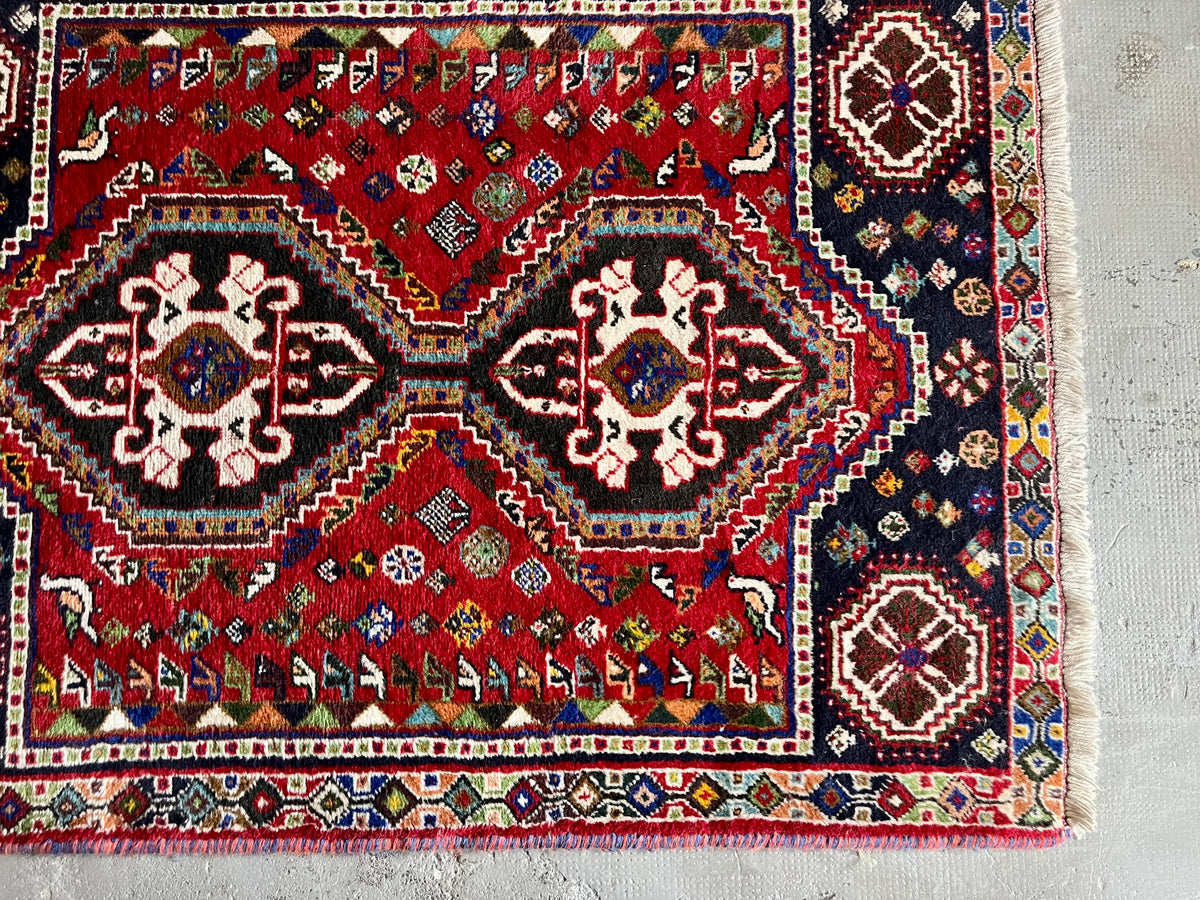 Tapis ancien à motifs  Décoration Patine