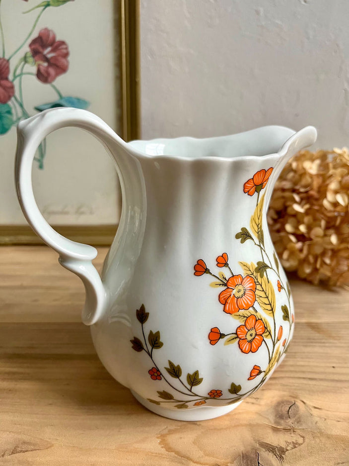 Pichet fleurs oranges