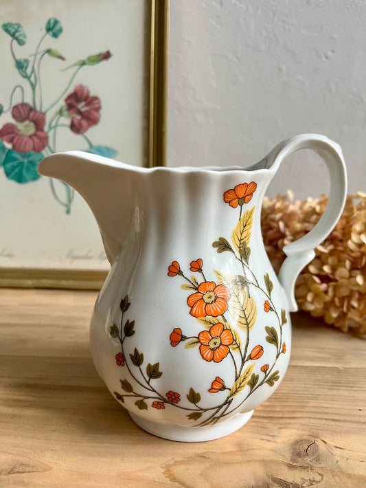 Pichet fleurs oranges