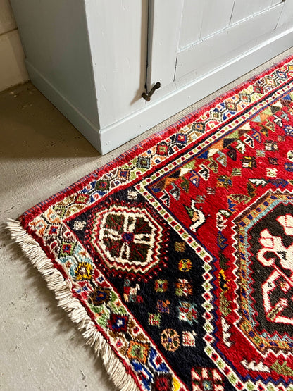 Tapis ancien à motifs  Décoration Patine