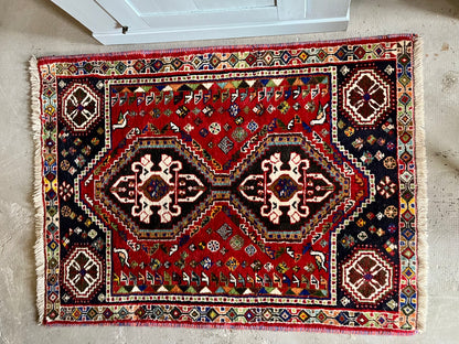 Tapis ancien à motifs  Décoration Patine