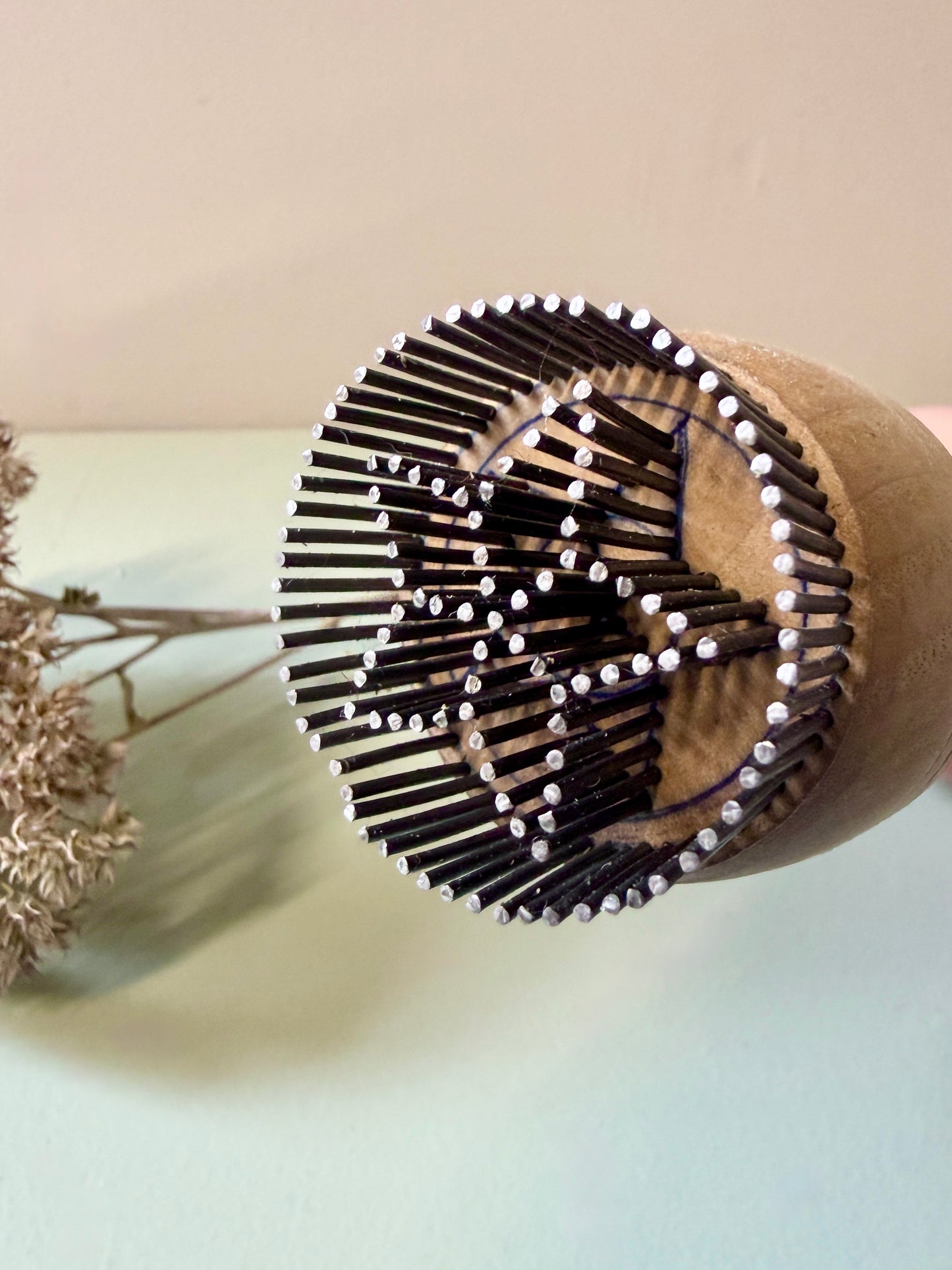 Tampon à pain en bois et métal