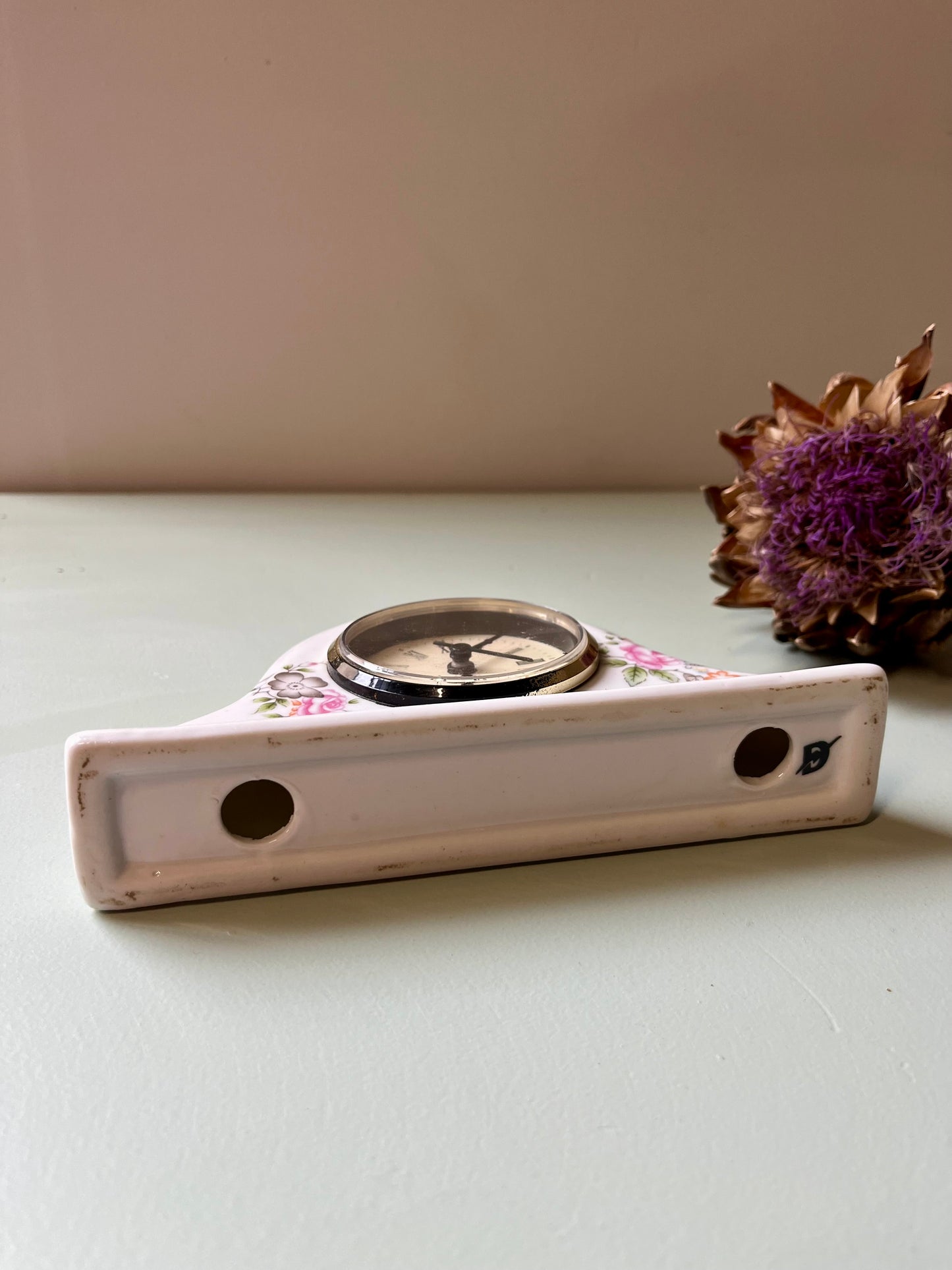 Petite horloge ancienne en céramique « Quartz »