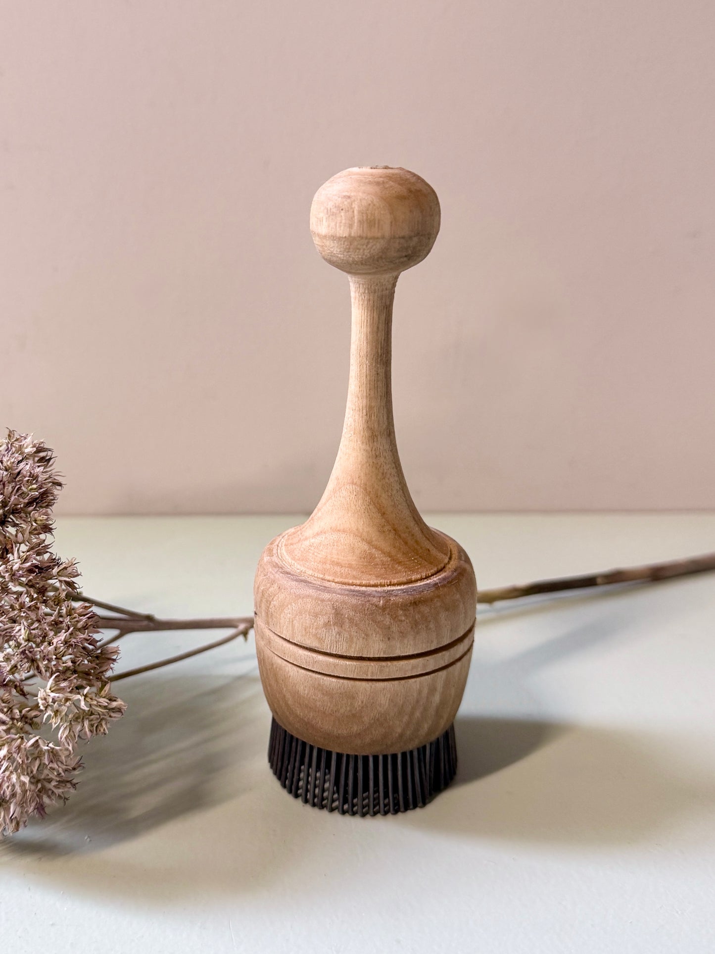 Tampon à pain en bois et métal