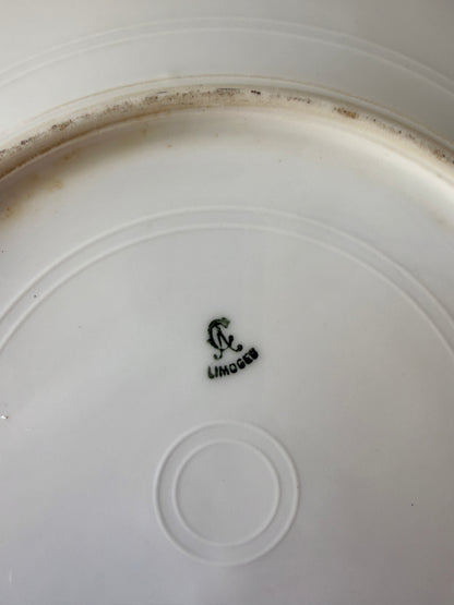 Assiette plate en porcelaine de Limoges