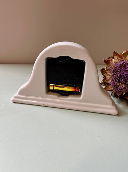 Petite horloge ancienne en céramique « Quartz »