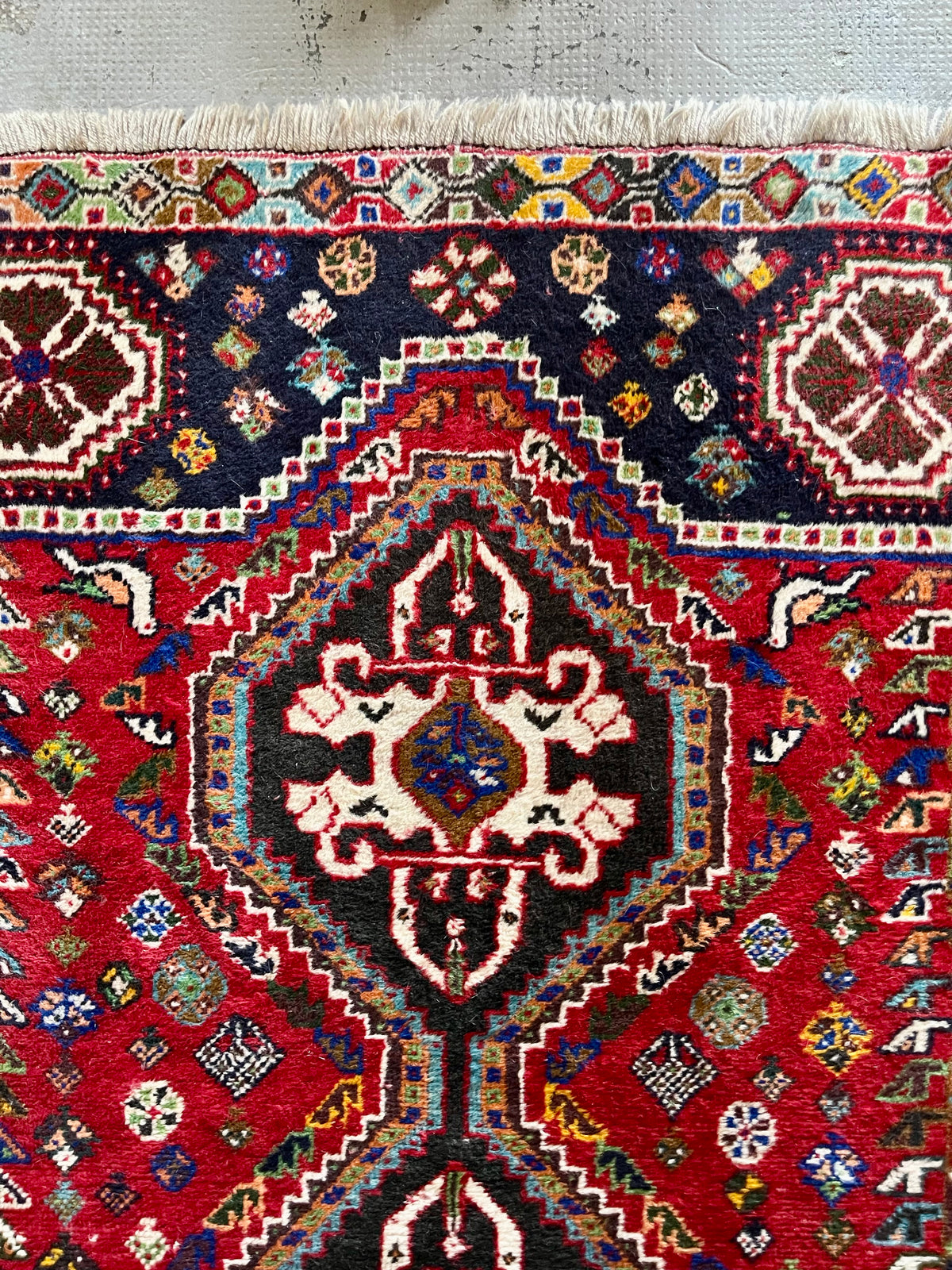 Tapis ancien à motifs  Décoration Patine