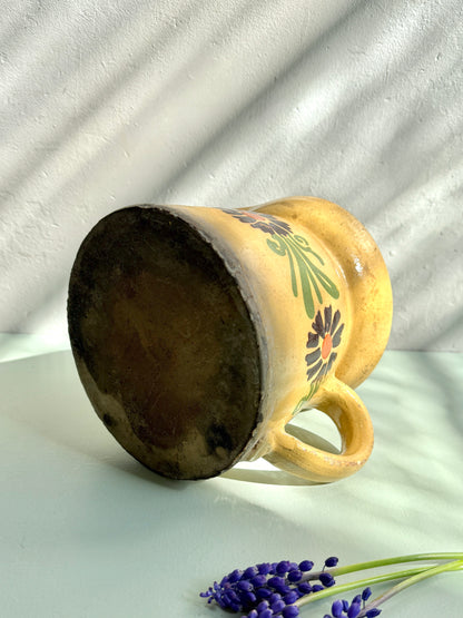 Pichet émaillé en terre cuite frise floral