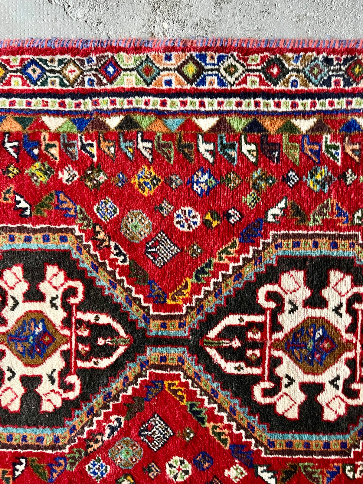 Tapis ancien à motifs  Décoration Patine