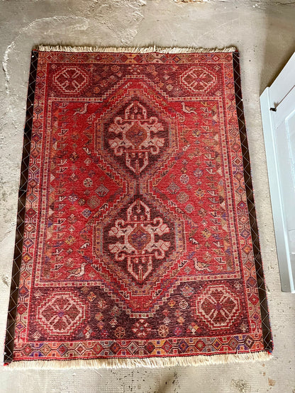 Tapis ancien à motifs  Décoration Patine