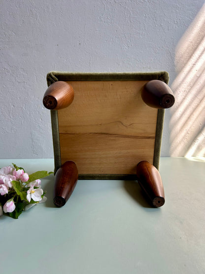 Repose pied en velours vert