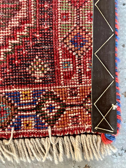 Tapis ancien à motifs  Décoration Patine