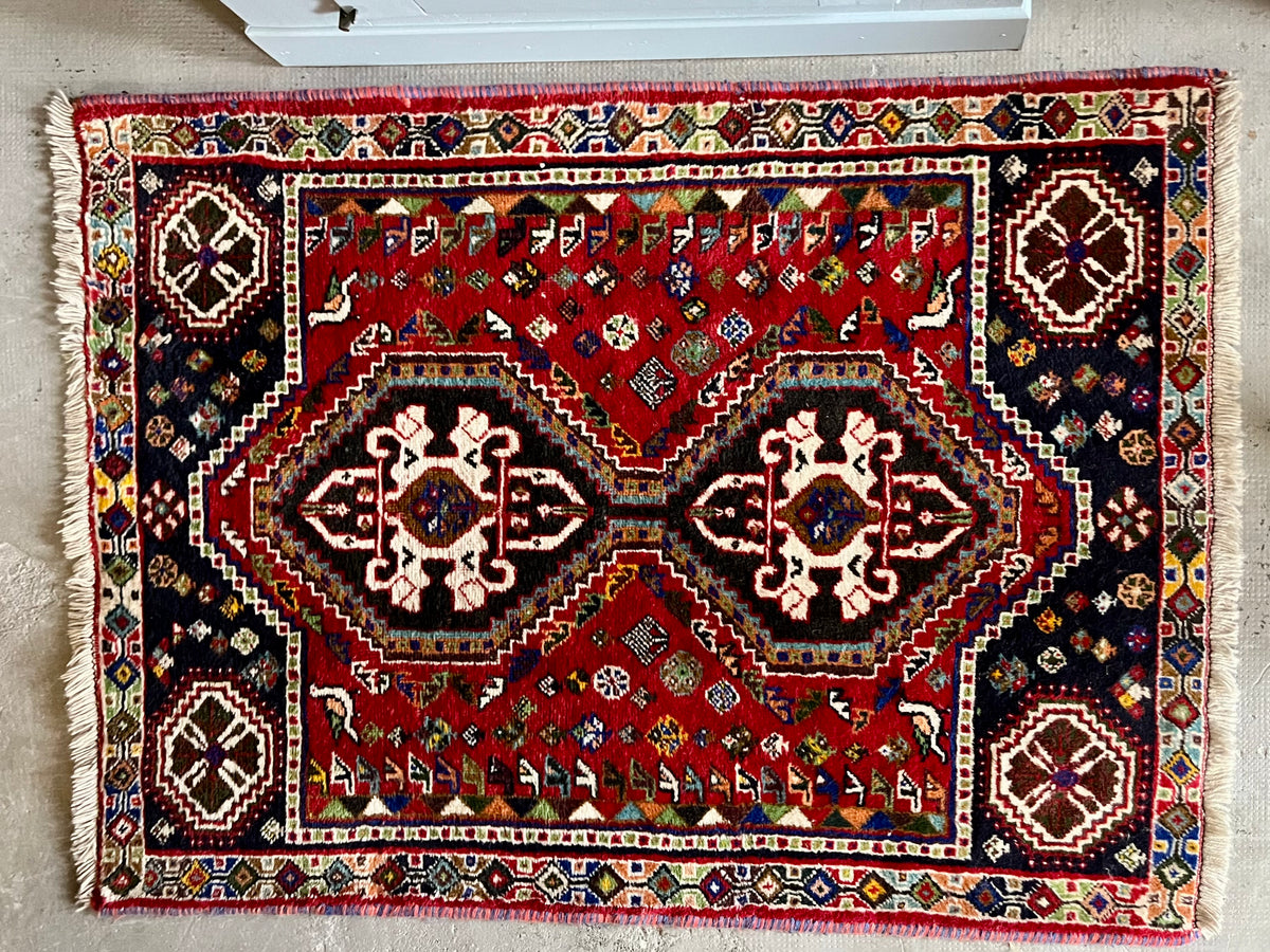 Tapis ancien à motifs  Décoration Patine