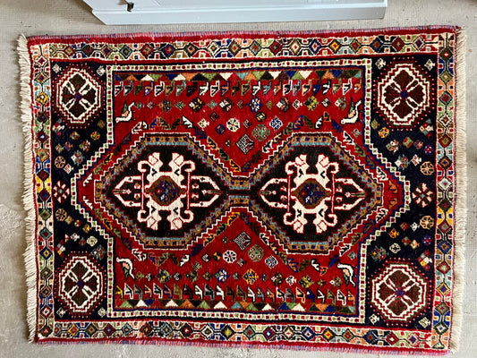Tapis ancien à motifs  Décoration Patine