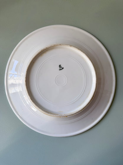 Assiette plate en porcelaine de Limoges