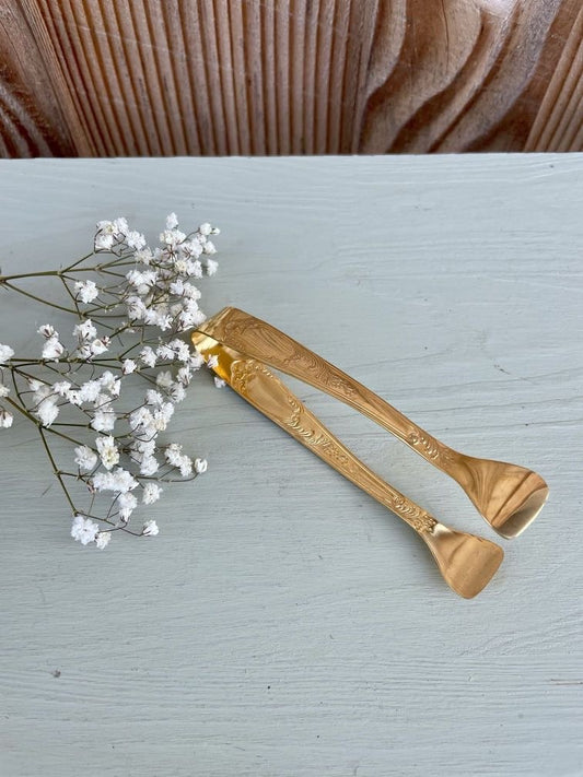 Pince à sucre en métal doré