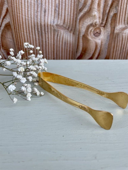 Pince à sucre en métal doré