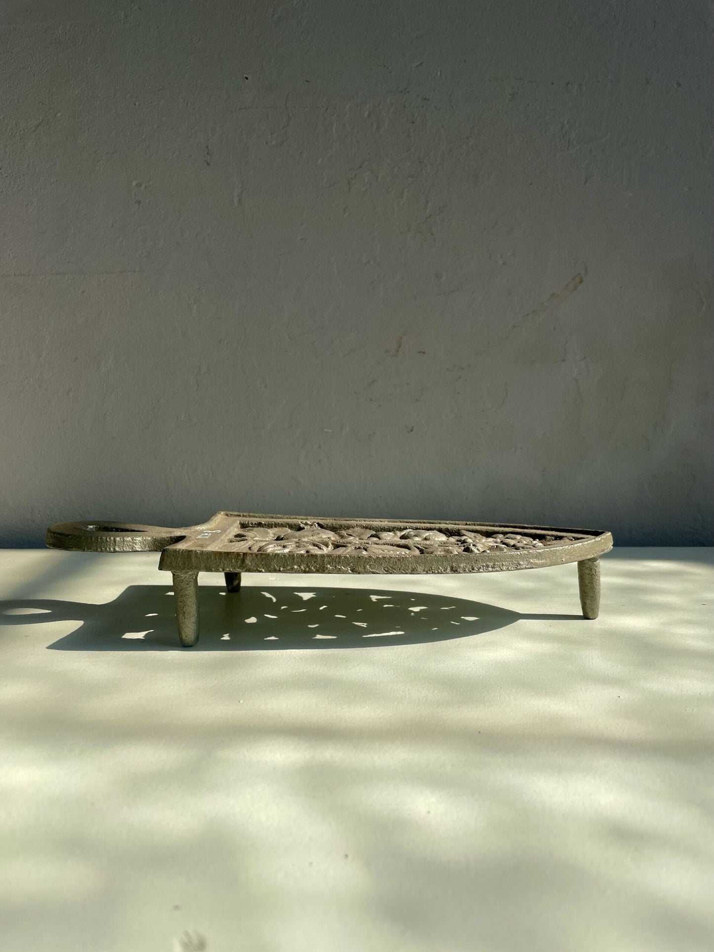 Dessous de plat en fonte