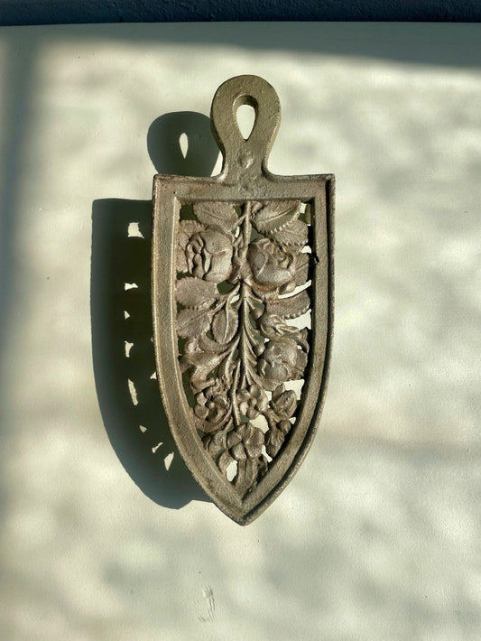 Dessous de plat en fonte