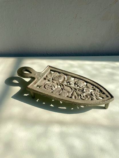 Dessous de plat en fonte