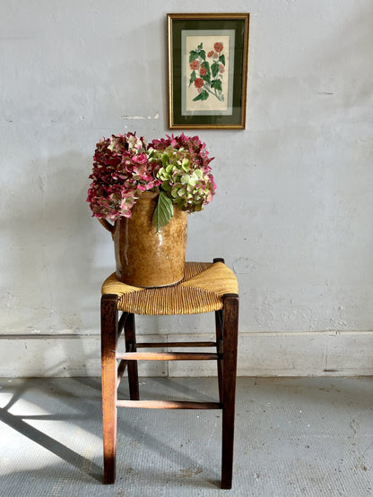 Tabouret ancien en bois et assise en paille tressée