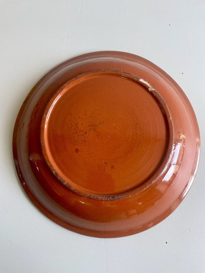 Plat en terre cuite à fleurs