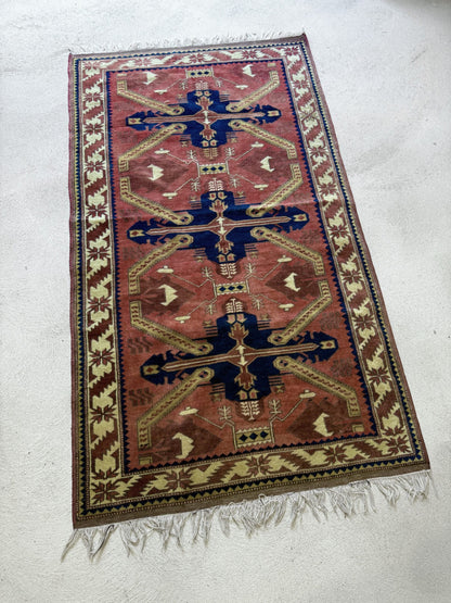 Tapis persan rouge vintage