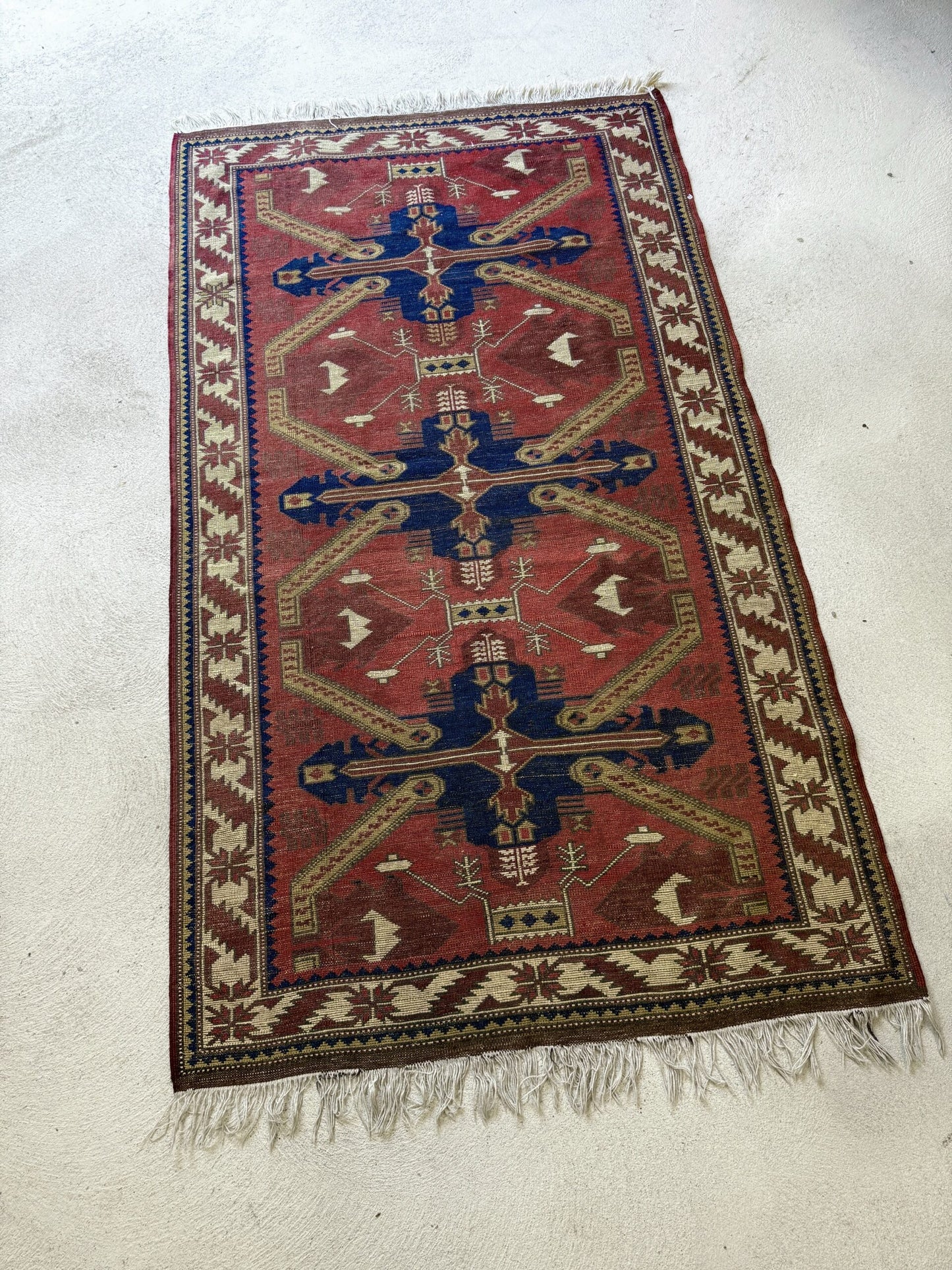Tapis persan rouge vintage