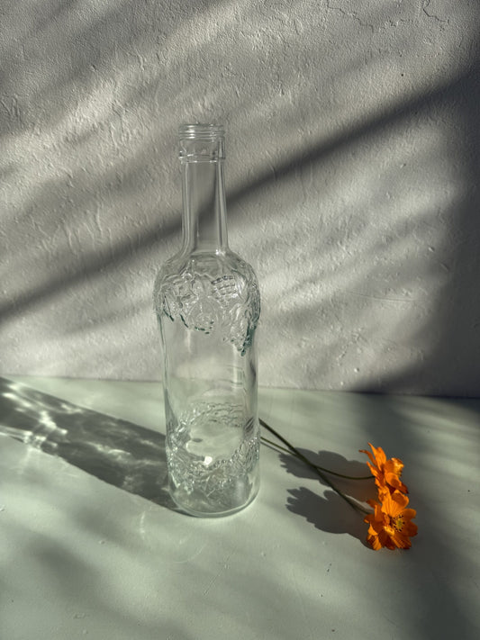 Bouteille en verre taillé