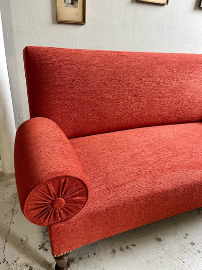 Canapé ancien rouge orangé