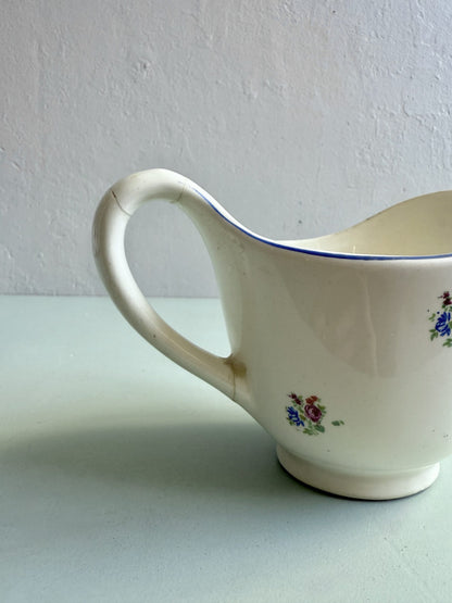 Ancien pot à lait en faïence émaillée décor floral