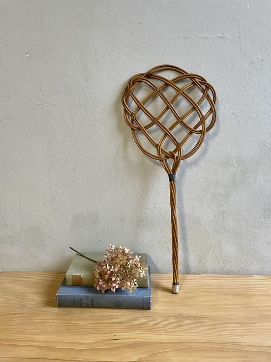 Battoir à tapis vintage en osier