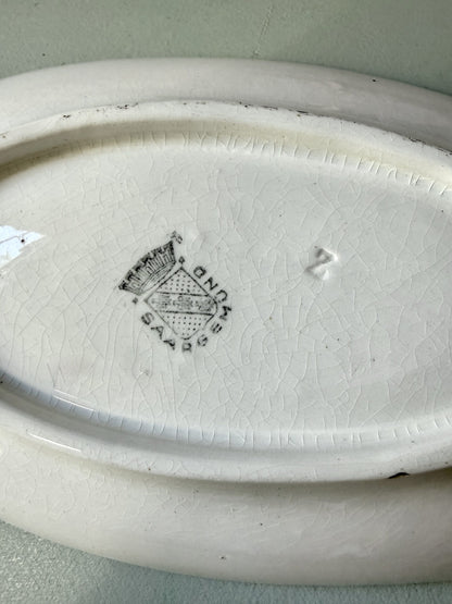 Ravier ancien Sarreguemines ovale – décor floral et liseré bordeaux