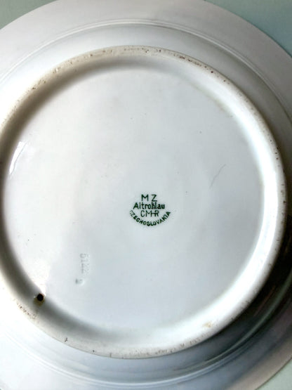 Assiette creuse en faïence fleurie