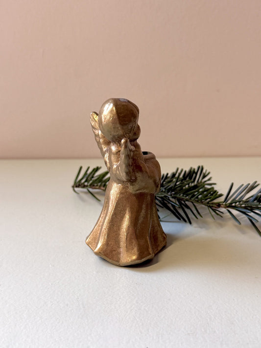 Bougeoir en forme d’ange en étain