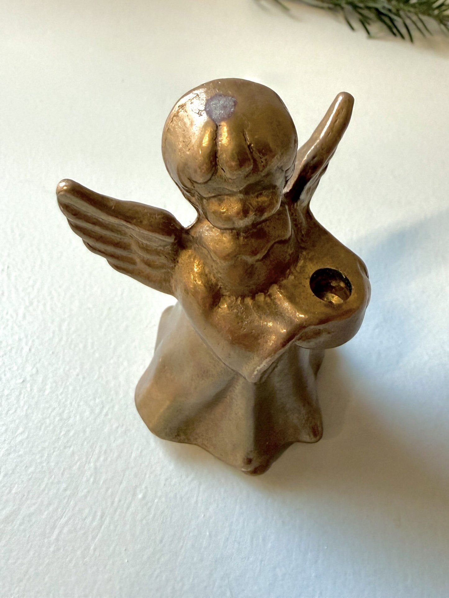 Bougeoir en forme d’ange en étain