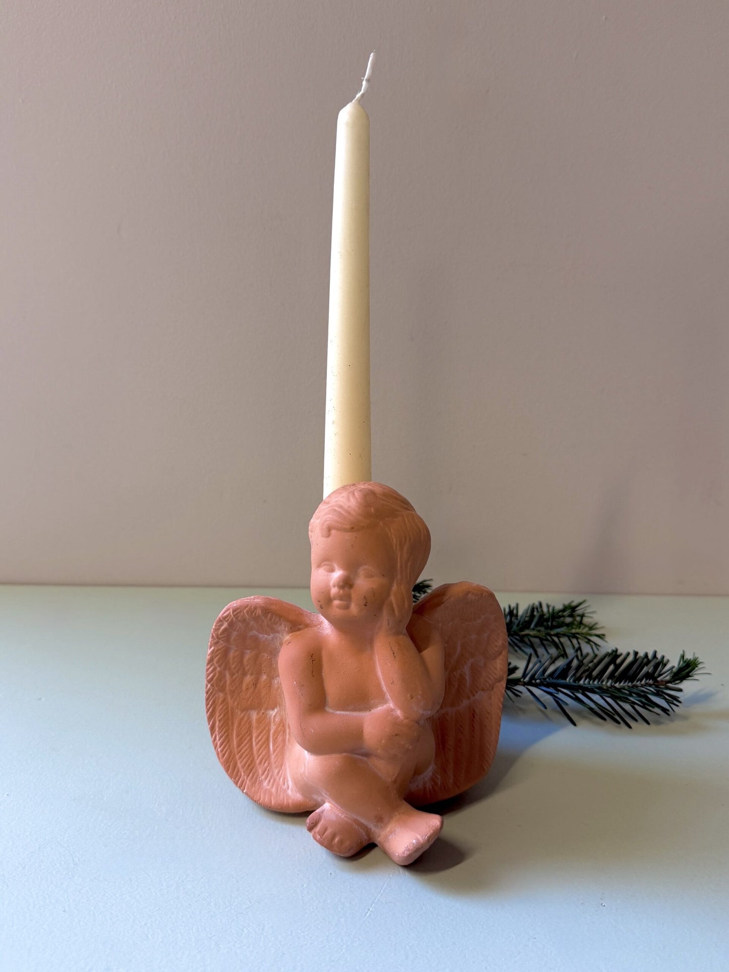 Bougeoir ange en terre cuite