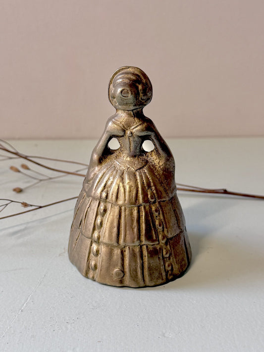 Cloche à main en laiton en forme de bergère