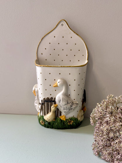 Pot mural à ustensiles avec des oies