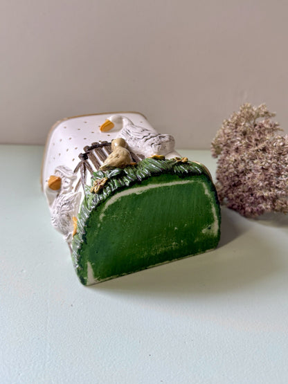 Pot mural à ustensiles avec des oies